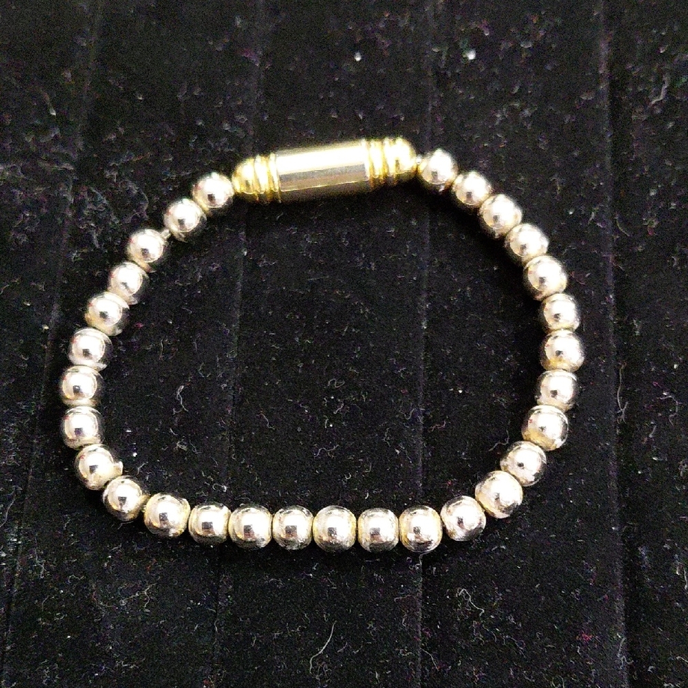 Chic Two-Tone Beaded Bracelet. The Clasp Is Gold Tone And Magnetic Closure .